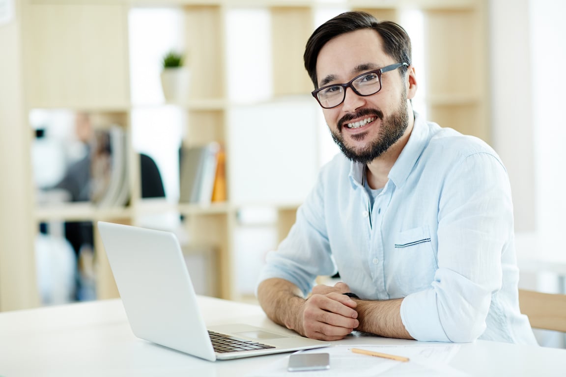 Asian Professional Working with Laptop